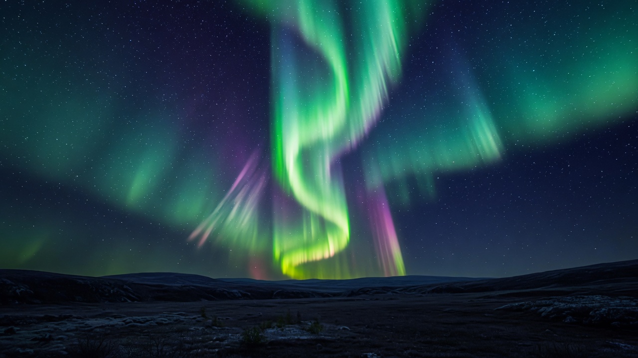 Night sky over a dark tundra horizon, with a vertical column of aurora as the axis.